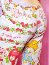 Load image into Gallery viewer, Pajama pants with cartoon character print on a pink background