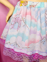 Load image into Gallery viewer, Skirt with cloud and castle design on a pink background