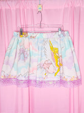 Load image into Gallery viewer, Upcycled skirt with She-Ra and castle design on a pink background