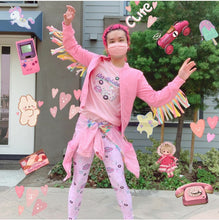 Load image into Gallery viewer, Man with pink hair modeling pink boombox leggings and t-shirt