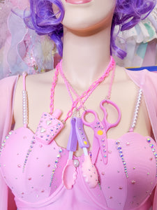 Pink and purple doll things chunky bling maximalist necklace
