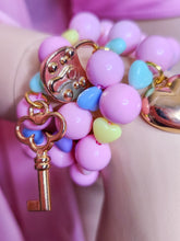 Load image into Gallery viewer, Pink lucite pastel rainbow heart dollcore stretch kandi bracelet YOU CHOOSE heart lock key