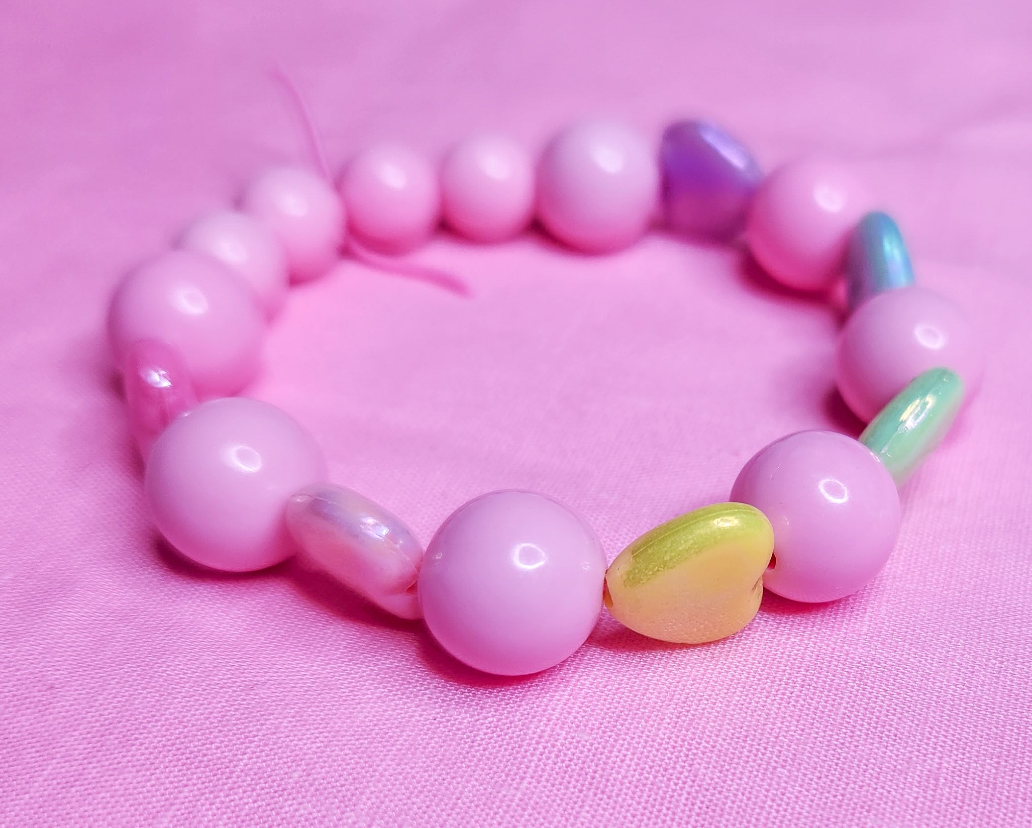 Pink lucite pastel rainbow iridescent heart dollcore stretch kandi bra –  Miss Alphabet