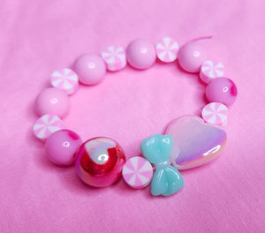 Christmas pink heart peppermint dollcore stretch kandi bracelet