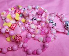 Load image into Gallery viewer, Pink fuchsia iridescent heart bow lovecore kandi stretch bracelet