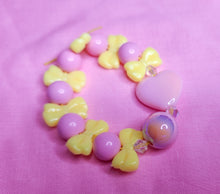 Load image into Gallery viewer, Pink yellow bling heart bow lovecore kandi stretch bracelet