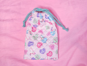 Conversation hearts lovecore quilted oxford drawstring bag