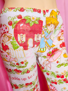 Capri pants with cartoon characters and strawberry pattern.