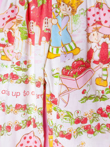 Fabric with cartoon characters and strawberry pattern