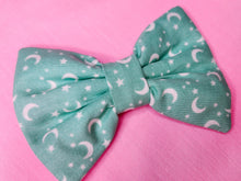 Load image into Gallery viewer, Mint green Halloween stars and moons hair bow, creepy cute witchy goth fashion hair clip