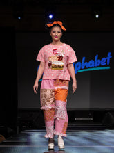 Load image into Gallery viewer, Mall food court patchwork pants, memphis print, pizza pretzel french fries, size Medium