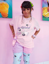 Load image into Gallery viewer, woman modeling t-shirt with pink barbie boombox miss alphabet logo motif and colorful clothing