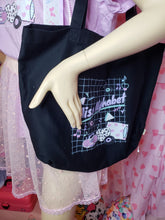 Load image into Gallery viewer, Miss Alphabet logo tote bag modeled by a mannequin