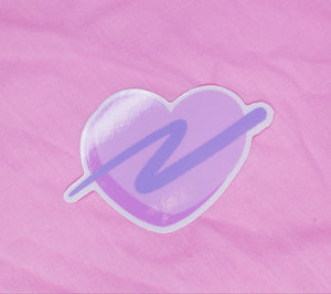 shiny sticker of a pink 90's heart with lavender swoosh