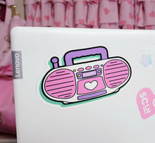 Load image into Gallery viewer, shiny sticker of a pink barbie style 90&#39;s boombox on a laptop