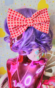 red heart gingham hair bow on lavender haired shiny pink mannequin bust