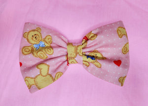 Pink Valentine's Day hair bow with hearts and teddy bears
