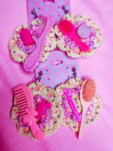 Load image into Gallery viewer, two pairs of crochet flower earrings with barbie brushes and combs, sprinkled with rhinestones