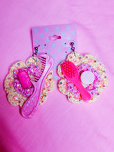 Load image into Gallery viewer, pink and yellow crochet flower earrings with barbie brushes, combs, a lotion bottle, sprinkled with rhinestones