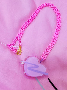 pink enamel chain necklace with pink and lavender glitter swoosh heart acrylic pendant