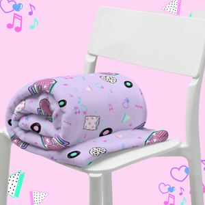 lavender barbie boombox blanket rolled up on a chair