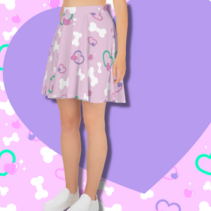 Pink skater skirt with bone and heart print on model