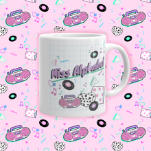 Load image into Gallery viewer, mug with pink miss alphabet barbie boombox logo motif