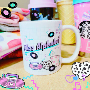 90's themed mug with cute coffee cups in background