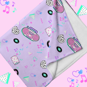 lavender blanket with pink barbie boombox print
